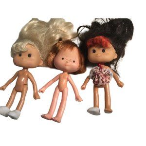 Three 5 inch dolls- one 1979 Strawberry Shortcake Doll